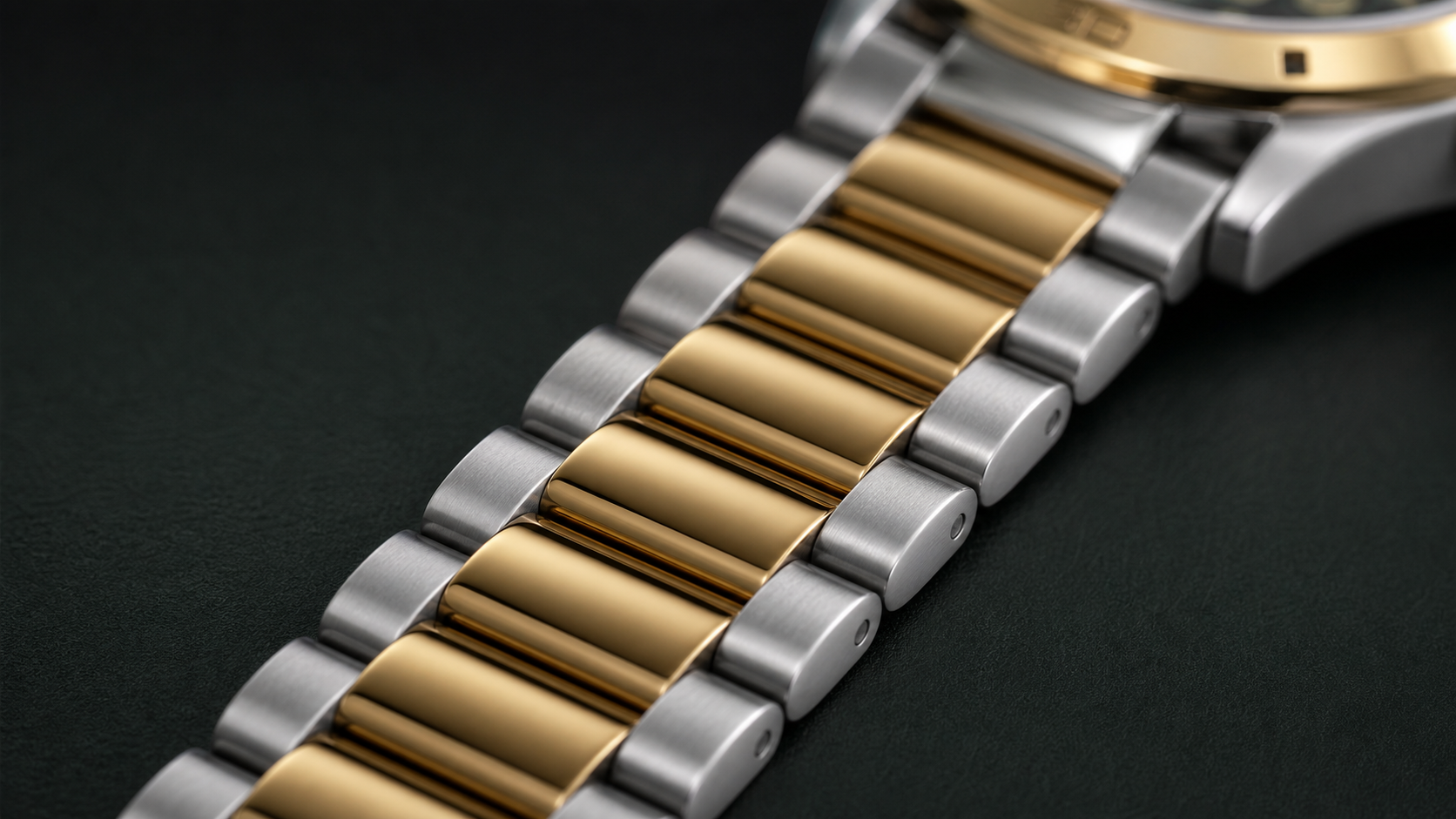 Close view of the CA-202 gold-and-silver-tone metal bracelet